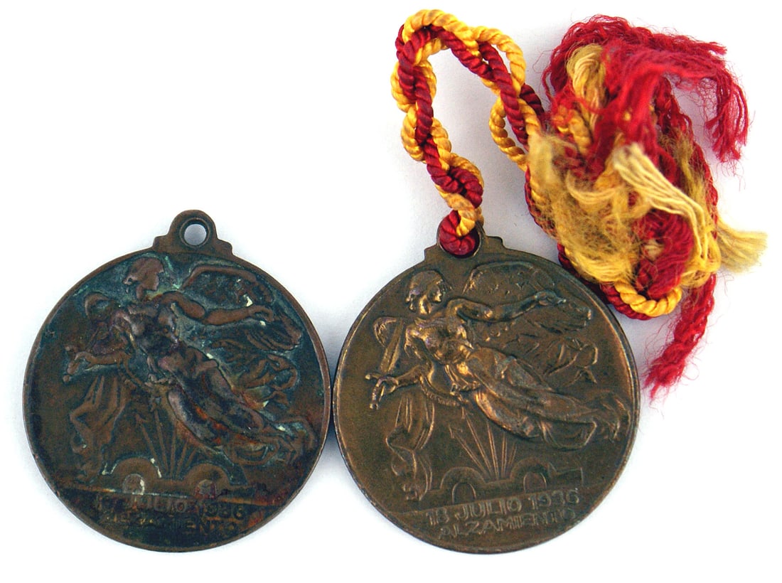 2 bronze Spanish Victory Medals Civil War: B-235 Lot of 2 bronze Spanish Victory Medals for the success in the Spanish Civil War. Obverse has three marching allies - German, Spanish and Italian soldiers. Reverse has an allegorical figure. II