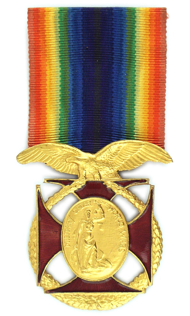 US MILITARY ORDER OF THE WORLD WAR badge: B-240 US "MILITARY ORDER OF THE WORLD WAR" membership badge - open gold laurel wreath holding a gold oval with a figure of "Justice" holding scales and a sword, on a red enameled cross. A spread winge