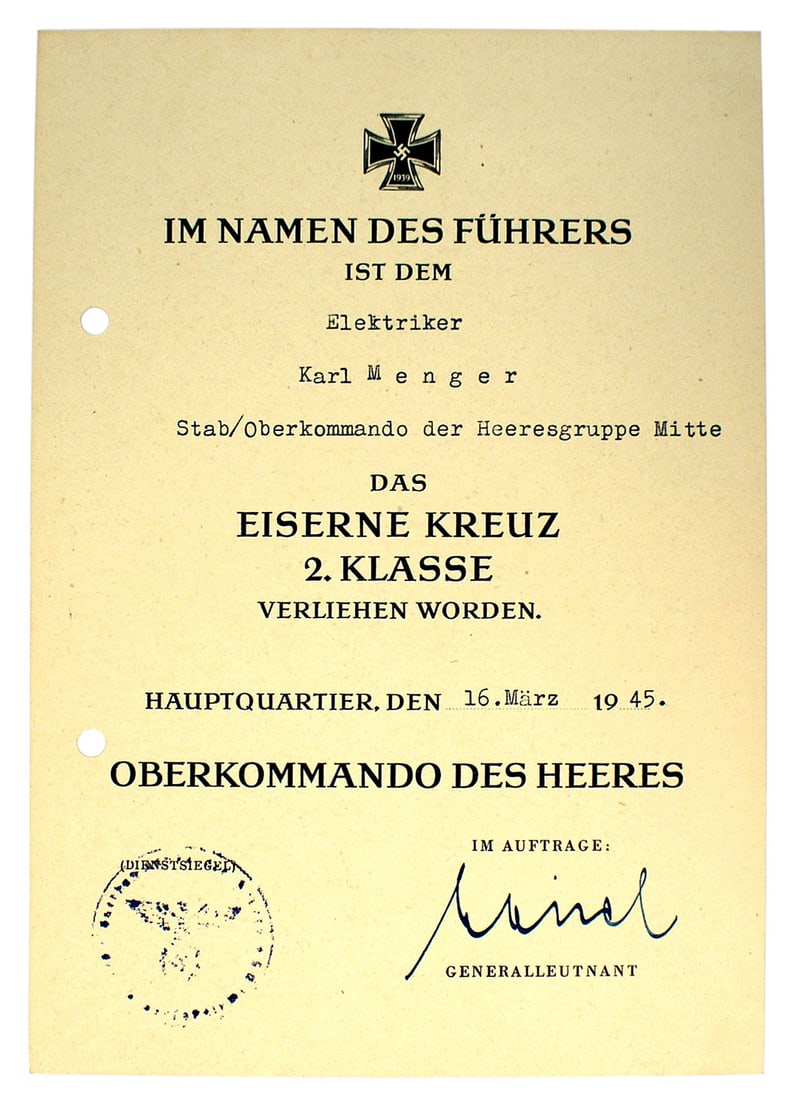 German WWII citation for the Iron Cross 2nd Class: C-008 German WWII citation for the Iron Cross 2nd Class presented to Elektriker Karl Menger - Stab/Oberkommando der Heeresgruppe Mitte on 16 March 1945. Ink stamp with eagle/swastika and lettering is 