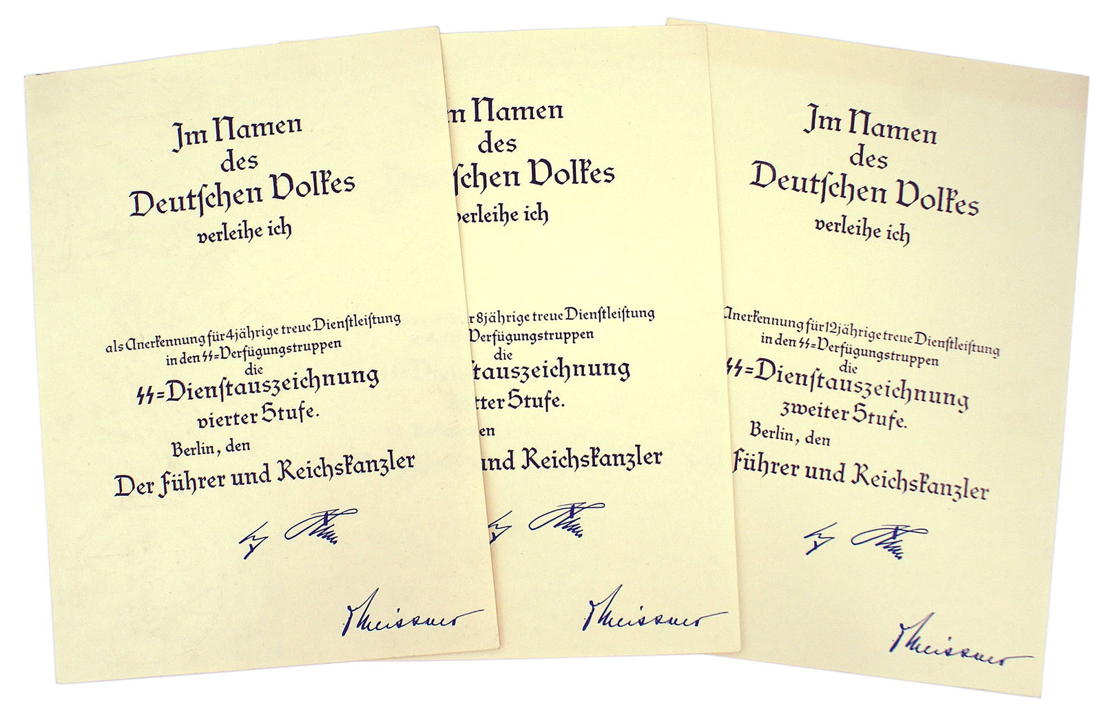 3 German WWII unissued award documents SS Loyalty: C-010 Lot of 3 German Third-Reich unissued award documents. Includes the SS-4 year, 8 year and 12 year awards for Loyal Service. None are named. With an embossed large eagle/swastika in an oak leaf wr