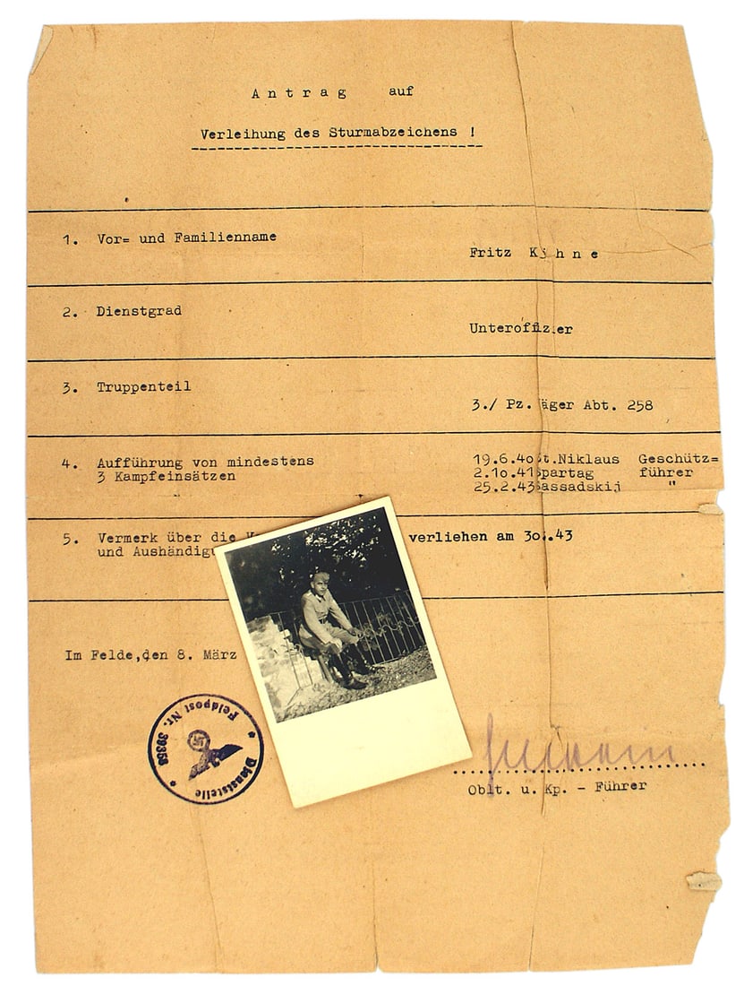 German WWII document Assault Badge: C-015 German WWII "Antrag...", one page document testifying that Fritz Kahne of the 3. 1 Panzer Jager Abteilung 258 was awarded an Assault Badge for action against Panzers and infantry in March, 1943.
