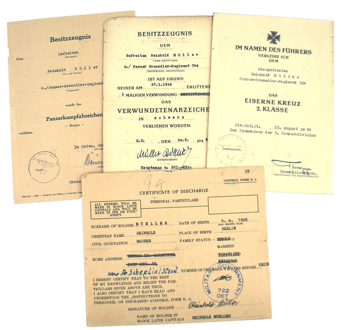 German WWII documents Panzer Wound Badge: C-016 Lot of German WWII documents named to a Reinhold Muller of the 394th Panzer-Grenadier Regiment: (1) Panzer Assault Badge - Bronze. Dated 2 Nov. 1943 and signed by the Oberstleutnant and Regiment