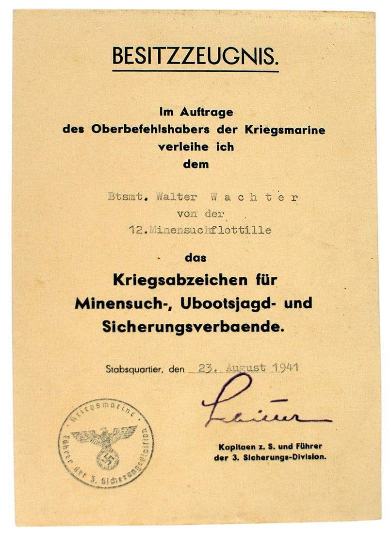 German WWII Navy certificate Minesweeper Badge: C-017 German WWII Navy certificate for a Minesweeper Badge. Awarded to a member of the 12th Mine Searching Flottilla. Dated 23 August 1941. Stamped with the "3rd Navy Security Division" eagle/swastika