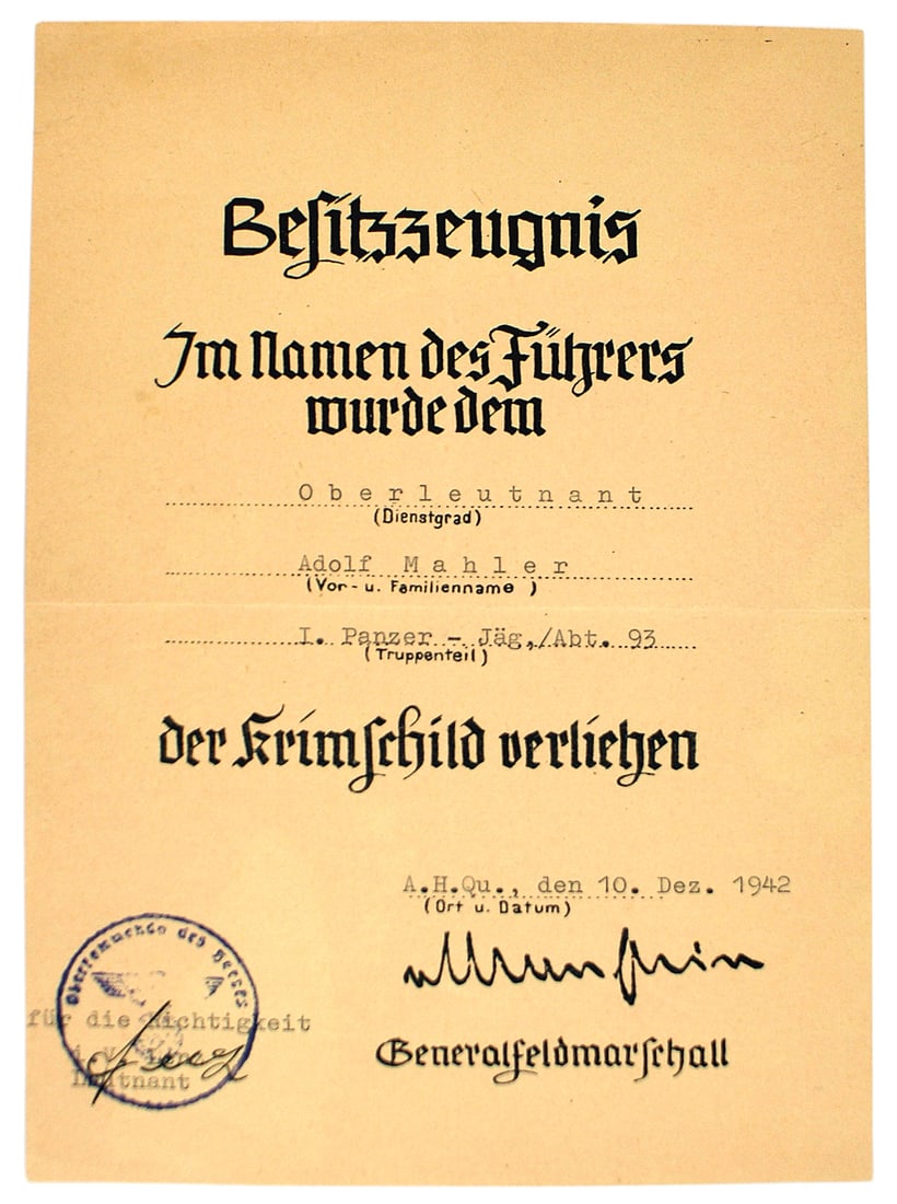 German WWII certificate Krim Shield: C-018 German WWII certificate for a "Krimschild". Awarded to 1st Lieutenant Lt. Adolf Mahler serving with "1 Panzer - Jagd/ Apt. 93." Awarded on 10 Dec. 1942. Facsimile signature of Generalfeldmarscha