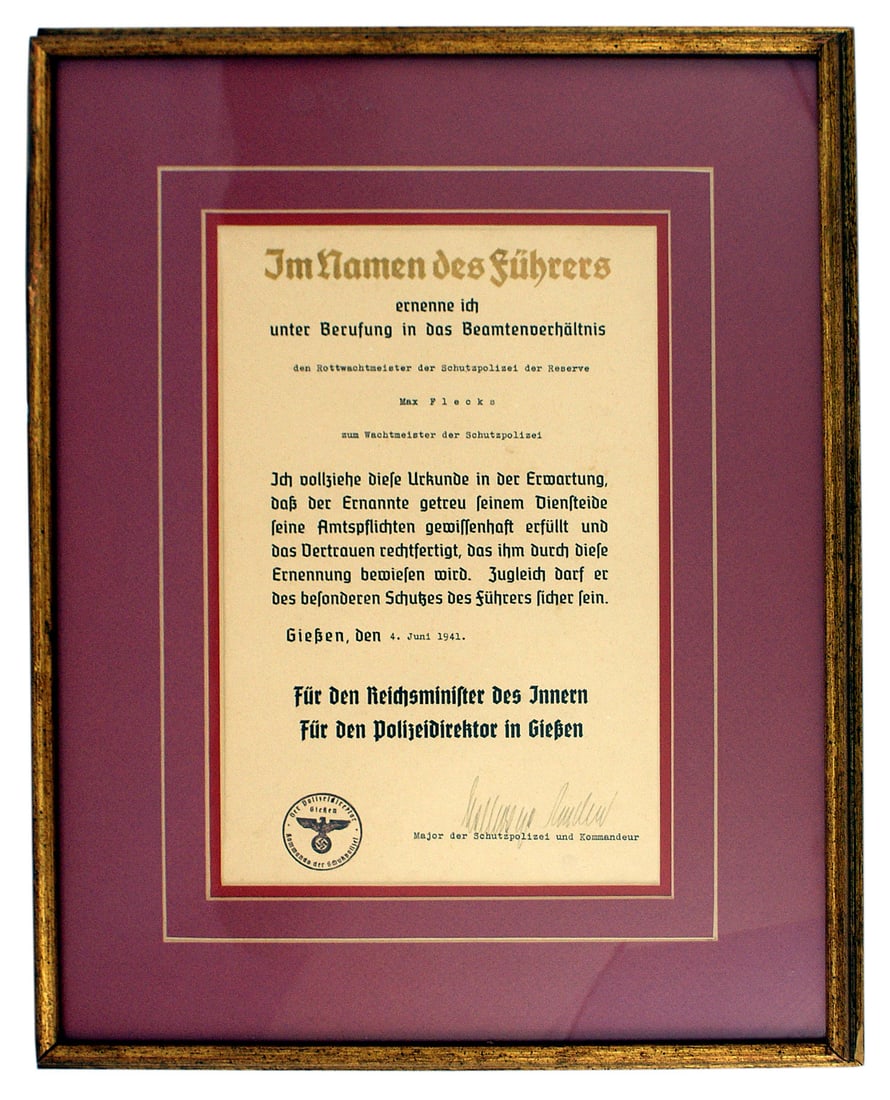 German WWII Police promotion document Schutzpolizei: C-019 German Third-Reich Police promotion document. "Im Namen des Fuhrers" (in gilt lettering), a promotion of Max Flecks to Wachmeister of the "Schutzpolizei". Dated "4 June 1941" and signed for "The