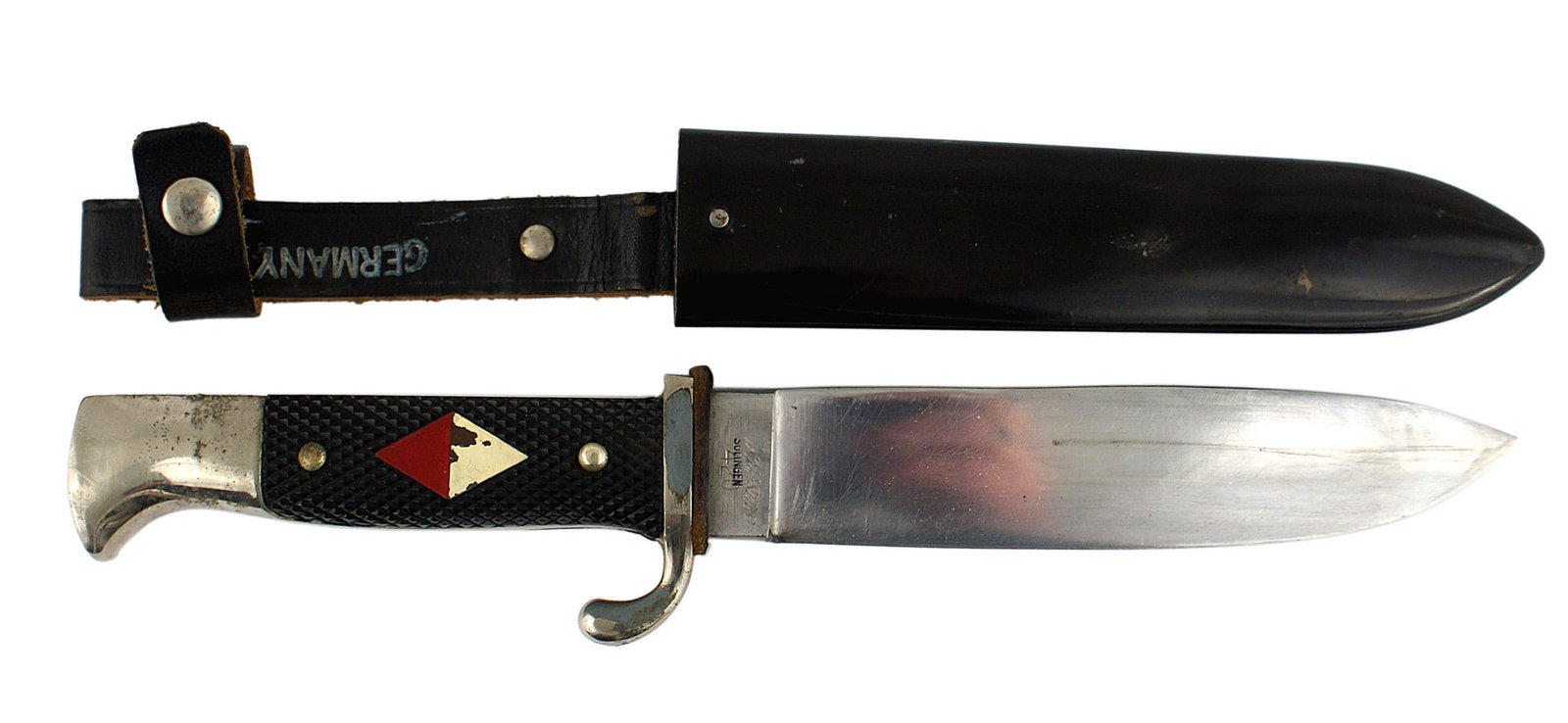 German post-war camper knife Hitler Youth: D-011 German post-war camper's knife, the same as a Hitler Youth knife but with a red/white diamond in the checkered black plastic grip, plain blade, marked with maker "GC Co. GERMANY" and "SOLINGEN" 