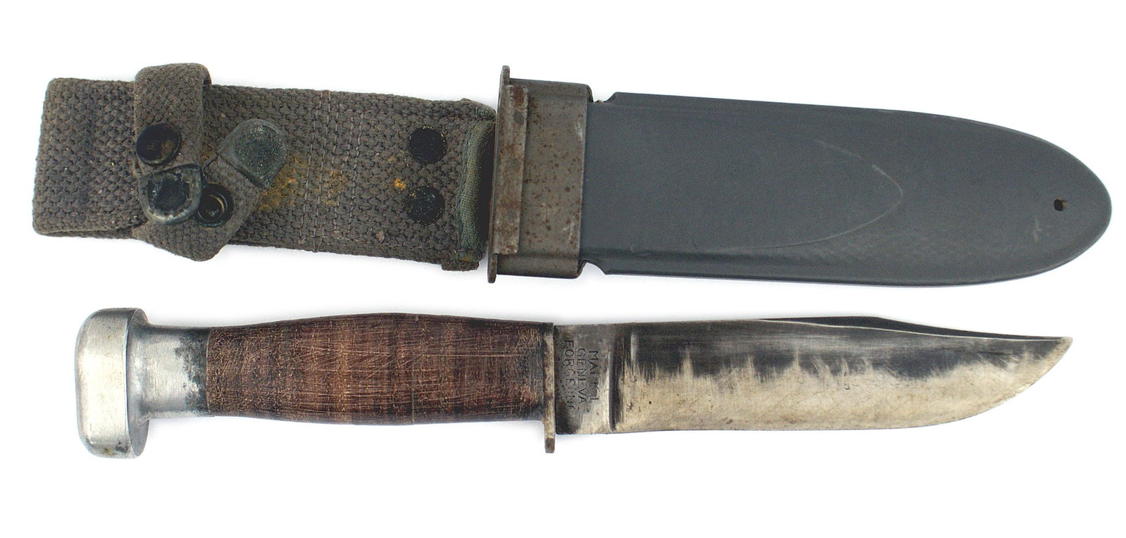 US WWII Navy Mark 1 knife: D-030 WWII US Navy Mark 1 knife. 5 1/8" blade shows wear, however about 35% of the original bluing remains. Marked "USN" and "MARK 1 - GENEVA - FORCE INC." Flat oval aluminum pommel small steel crossg