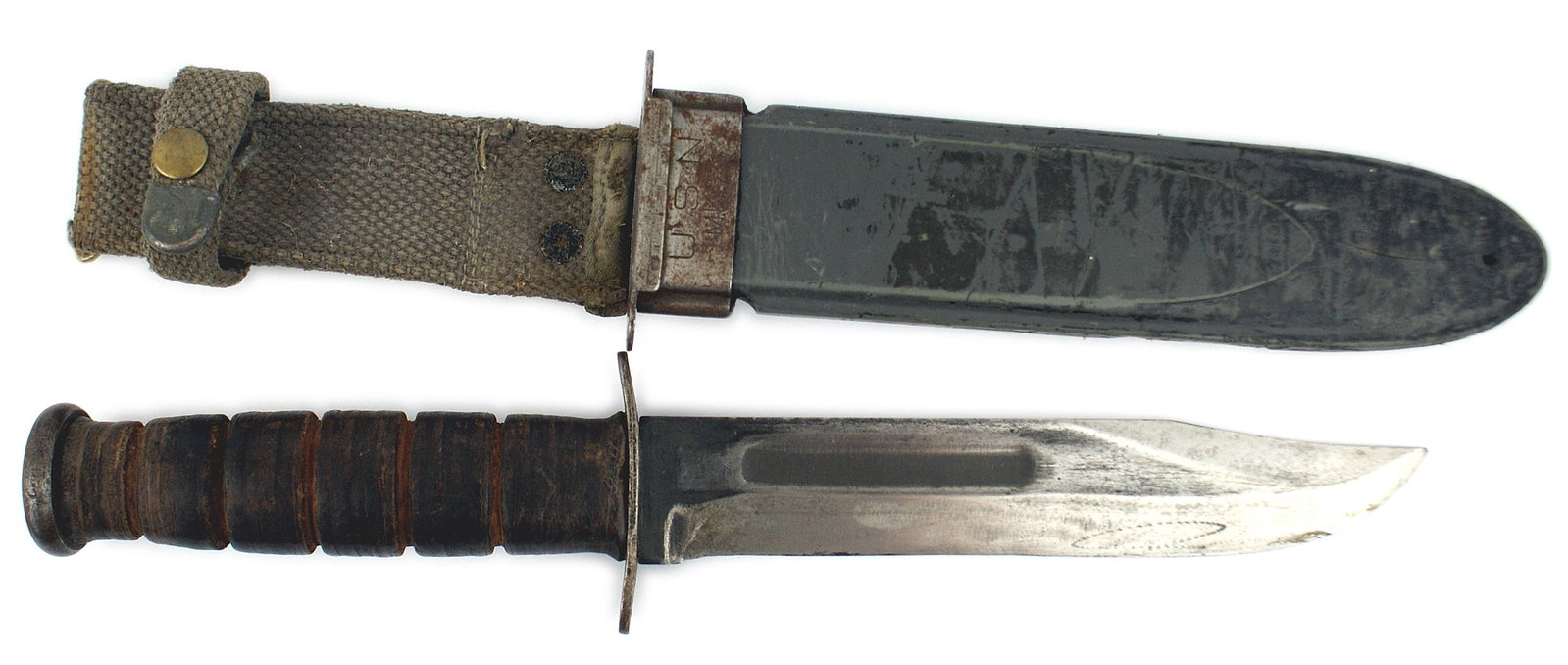 US WWII Navy Mark 2 knife: D-031 US WWII Navy Mark 2 knife. 1 1/8" wide, 6 7/8" blade with about 10% of the bluing remaining. Steel crossguard marked "KA-BAR" and "USN - MK2". Leather washer grip and a flat round steel pommel. 
