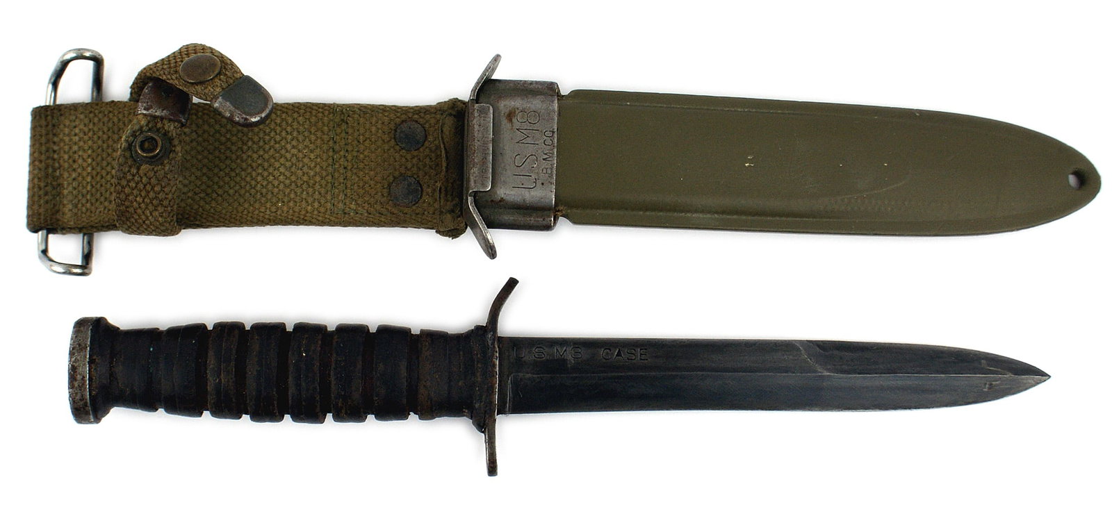 US M3 1WWII 943 trench knife: D-041 US M3 1943 trench knife. Oval pommel cap. Seven grooves leather washer grip. 6 3/8" blade is stamped "US M3 CASE". 75% of bluing remains. Type 2 period plastic scabbard with hook attachment. Met