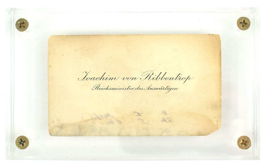 German WWII Joachim von Ribbentrop business card: A-004 "Joachim von Ribbentrop - Reichsminister des Auswartigen" - in script. 2 5/16" x 3 15/16". Card shows age and some foxing and also what appears to be a water stain. Reverse has a penciled name "