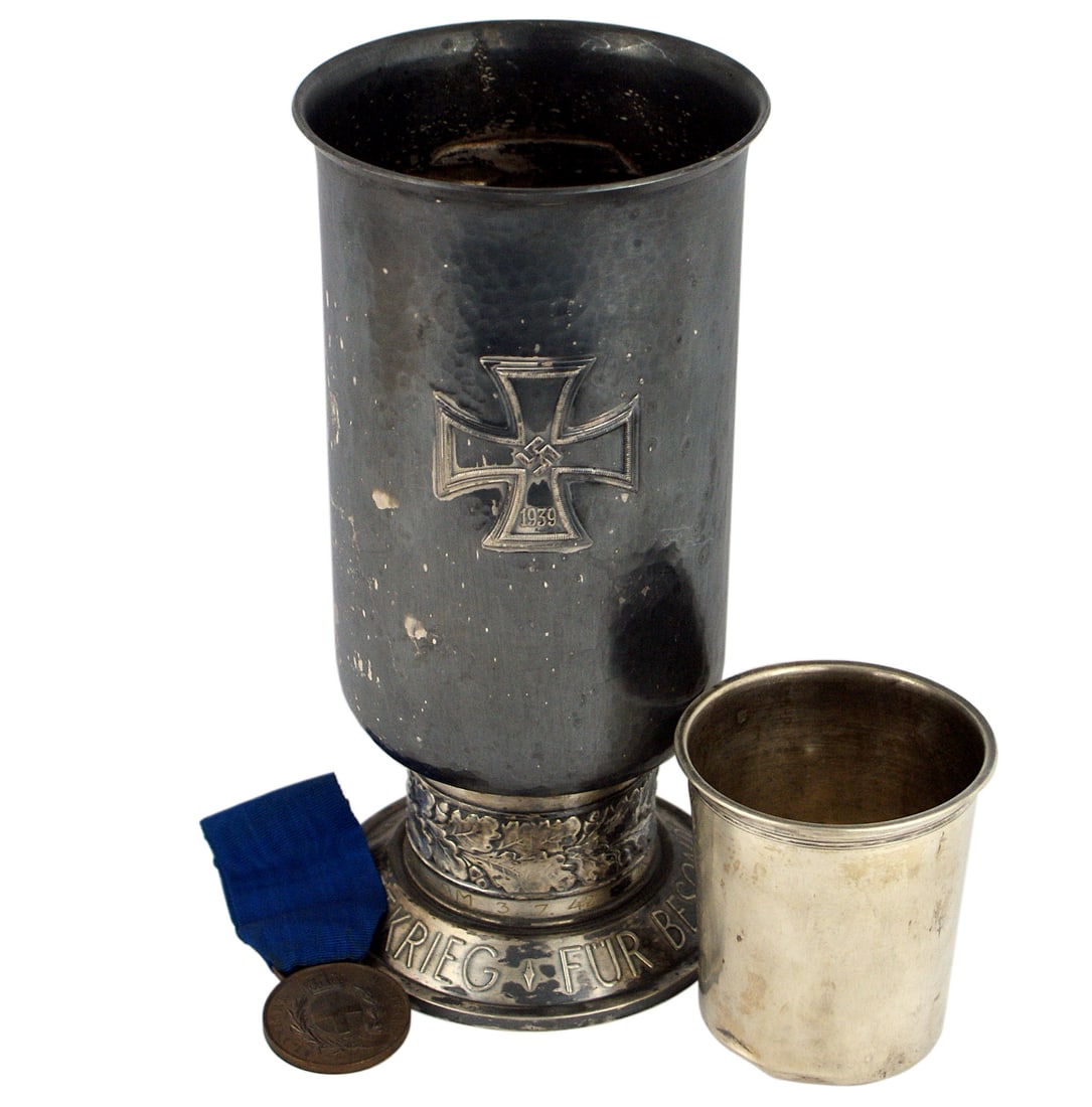German WWII Luftwaffe Ehrenpokal Honor Goblet: A-007 German WWII Luftwaffe "Ehrenpokal" awarded to a holder of the German Cross. Hammered silver Honor Goblet bearing an embossed panel of two eagles in combat. Reverse bears a 1 5/8" x 1 5/8" relief