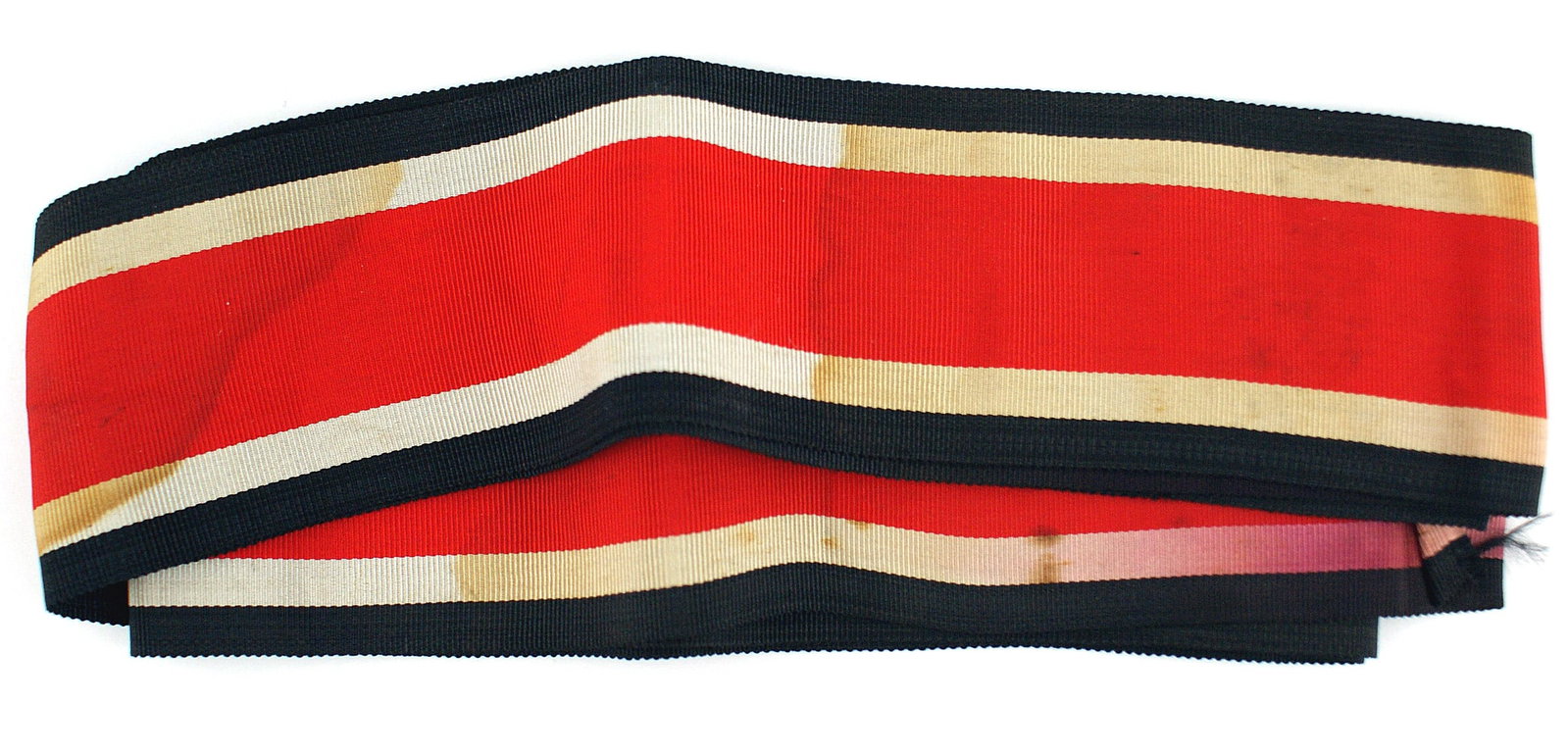 German WWII Grand Cross of the Iron Cross ribbon: A-010 Large 72" length of German WWII Grand Cross of the Iron Cross neck ribbon. The width measures 60 mm. The author of one of the references on the subject states that the intended size for Goring's