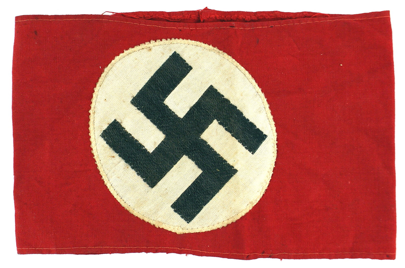 German WWII NSDAP armband: H-007 German Third Reich N.S.D.A.P. armband. Bevo embroidered black swastika on a 3 3/8" diameter white cloth disc sewn to the 4 3/8" wide red band. Was removed from a tunic. II