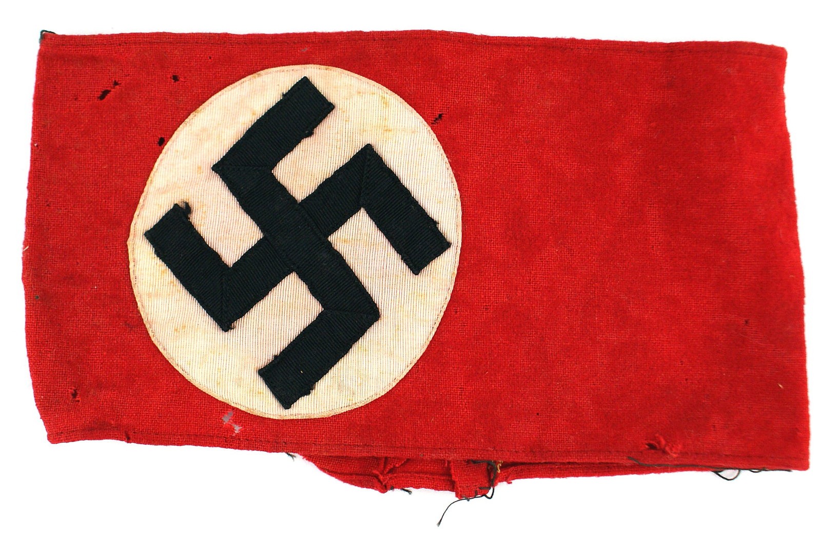 German WWII NSDAP armband: H-009 German Third Reich N.S.D.A.P. armband. Black ribbed ribbon swastika sewn to a ribbed white disc, sewn to a 4 1/4" wide red felt band. Reverse has a 1" wide section of red felt added to lengthen 