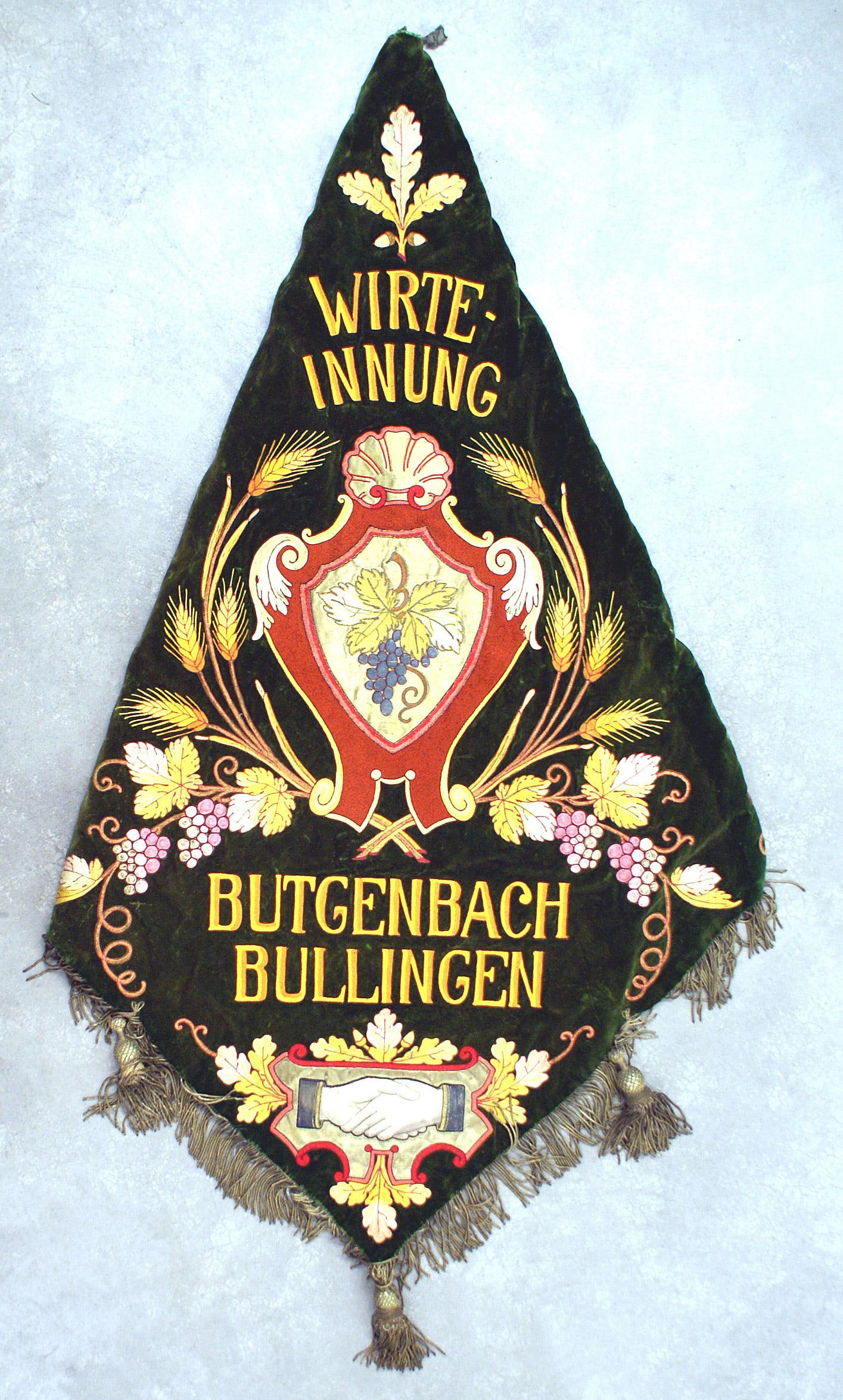 German WWII era district type flag: H-047 "Deutscher Werkmeister Verband." Organization of dedicated industrious businessmen. In this case a German inn keepers guild elaborate district tapestry type flag. Unusual "corner - type" with th