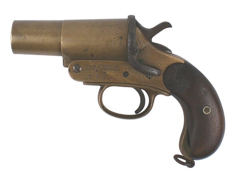 British WWI flare pistol: M-39 British WWI flare pistol. Brass frame with a 4 1/4" barrel. Revolver-shaped, a lever on left side pulls back a steel frame which allows the barrel to open. Marked with British proofs, "WEBLEY + S