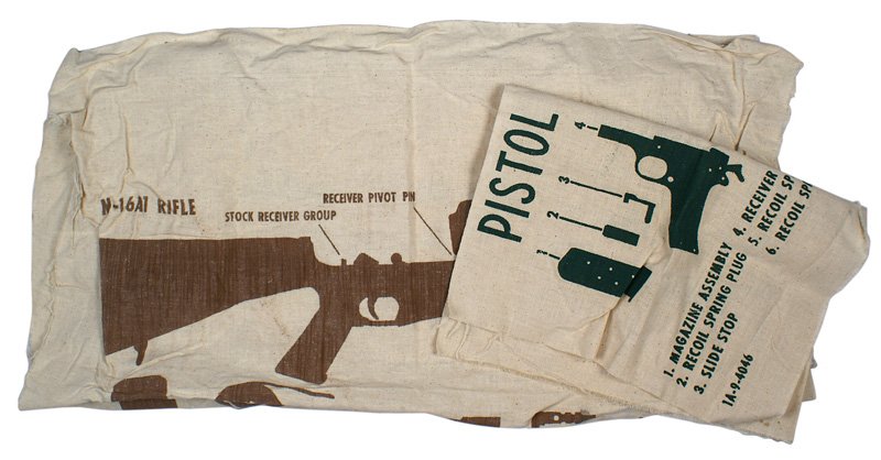 Lot 4 U.S. cloth gun Training Assembly Aids: M-49 Lot of 4 U.S. cloth weapons Training Assembly Aids: (1) .50 cal. M-2 (2) 7.62 MG. (3) Rifle 16 A-1. (4) .45 Pistol. All large size (largest: 40" x 24").II