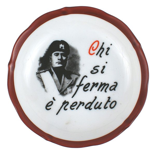 Italian Fascist porcelain plate Mussolini: G-10 Italian Fascist porcelain commemorative plate- Mussolini with"Chi si ferma e perduta". 4 3/8" diameter. Suspension "D" ring on reverse. II
