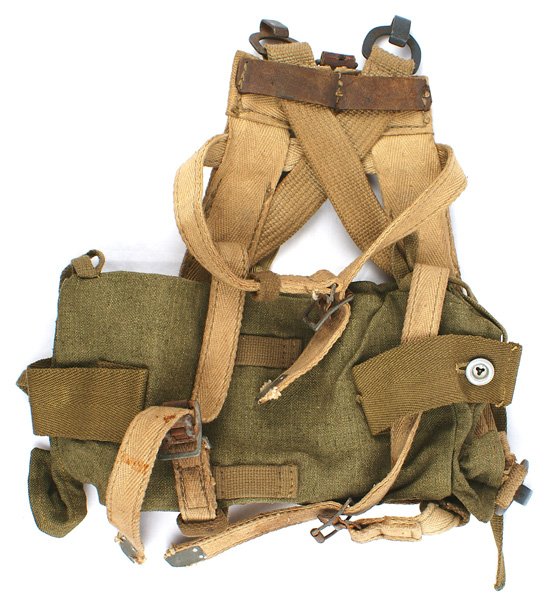 German WWII Army A frame: N-4 Army "A" frame. Tan fabric with four "D" ring/hook attachments and the OD cloth utility bag. Maker marked "Phil Knoch..." Shows some field wear. Rare. About II