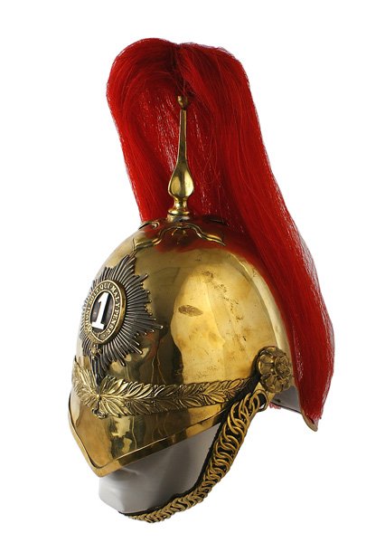 British M1872 Albert cavalry helmet: E-63 British M1872 Albert pattern cavalry helmet. Gilt brass body with a band of oak leaves around the base. Chain link type chinstrap with large "rose" bosses. Cross type base and partially fluted tr