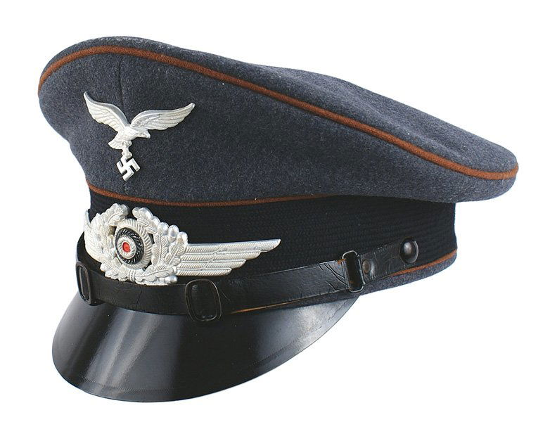 German Luftwaffe Signal peaked cap - named: E-95 German WWII Luftwaffe Signal EM peaked cap - named. Nice shape with a high peak. Blue gray wool material with a black band and cinnamon piping. White metal eagle/winged oak leaf wreath with a cen