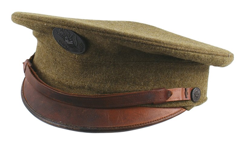 U.S. WWI era EM peaked cap: E-177 U.S. WWI era EM peaked cap. OD wool with a brown leather chinstrap and brim. Supple brown leather sweatband marked "PHILA. DEPOT - M. SCHLESINGER" and "CONTRACT MARCH 20, 1915". II