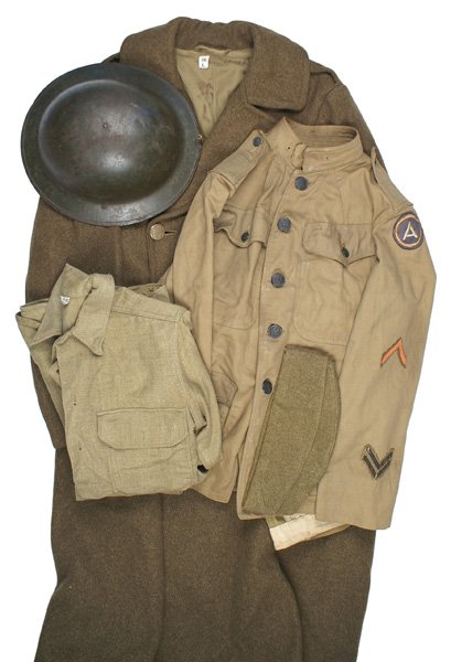 U.S. WWI lot tunic 1st Army helmet etc: F-55 U.S. WWI lot: Summer tunic with 1st Army patch, trousers, steel helmet (no liner), shirt, garrison cap with Engineers and "B" badge and overcoat. II