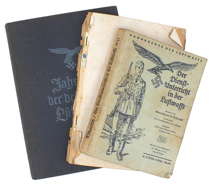 Lot 3 German WWII Luftwaffe books: I-21 Lot of 3 Luftwaffe books: (1) "Der Dienst in der Luftwaffe". 1941 manual with photos and illustrations of weapons training, (2) "Flieger-Kalender 1936". Statistics and photos/illustrations of fli