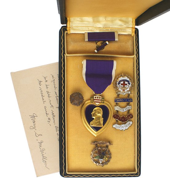 U.S. WWII Purple Heart named medal: B-142 U.S. WWII Purple Heart named to "JAMES F. MCMILLAN" in block letters. Also with two "shortshrift" 1935 U.S. dollar bills signed by seventeen airmen. McMillan who completed 20 missions on a B-25
