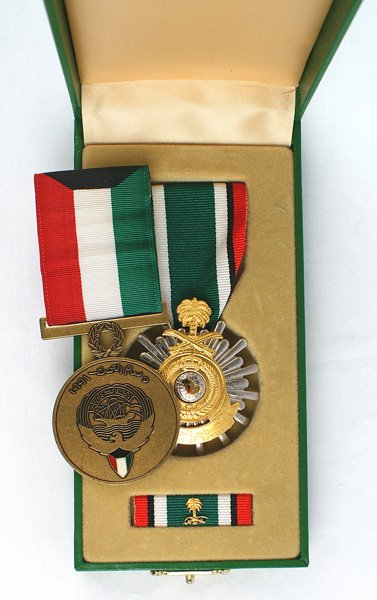 Lot of 2 Liberation of Kuwait medals: B-192 Kuwait. Lot of 2 Liberation of Kuwait medals: (1) Issued by Kuwait. (2) Saudi Arabia award. Cased with ribbon bar. I