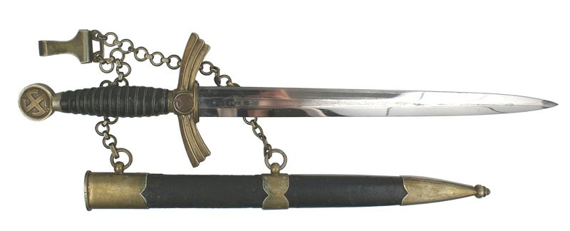 German WWII Luftwaffe 1st Model dagger: D-10 German WWII Luftwaffe 1st Model dagger. Brass finish worn on "sun wheel" swastika on pommel. Wire wrapped age darkened leather grip. Aged patina on turned-down "wings" crossguard a "sun wheel" ce