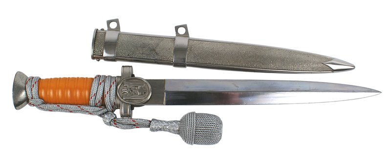 German WWII Social Welfare Leader dagger: D-15 German WWII Social Welfare Leader dagger. Nickeled, rounded flat top pommel and crossguard/langet bearing a relief eagle/swastika/Red Cross. 9 7/8" clean blade (subdued minute dimples). Excellent