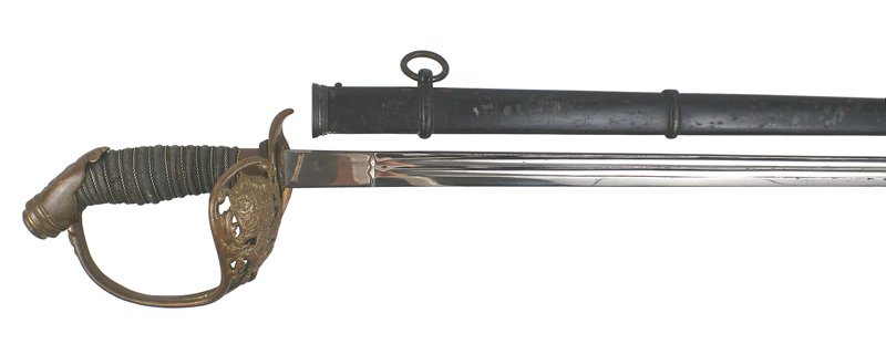 Wurttemberg M1889 degen sword Germany: D-54 Wurttemberg M1889 "degen". Brass pommel with crowned cypher of the king, reverse "D" knuckle bow and pierced guard bearing the state coat-of-arms. Fairly clean 29 3/4" straight blade. One ring bl