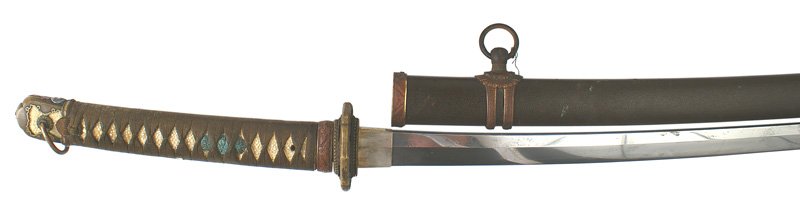 Japanese Katana samurai sword: D-59 Japanese Katana. Brown wrapped white sharkskin grip. Verdigris on the menuki. Silver family mon (three pointed star, with serpents forming the borders and the eyes of an animal head) mounted on t
