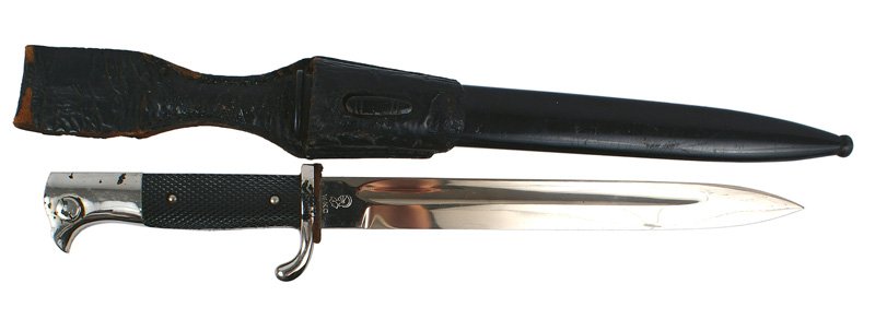 German WWII Army parade dress bayonet: D-87 German Army Third-Reich parade dress bayonet. Excellent 9 1/2" blade. Marked as above. Nickel peeled on two small spots on the press stud - otherwise fine condition. Some light scratches on the b