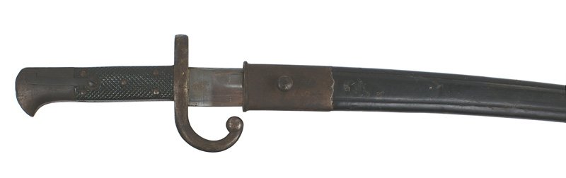 Turkish NCO bayonet Peabody-Martini: D-106 Turkish NCO bayonet for the Peabody-Martini Rifle M1874. Black leather grips with 5 steel rivets. Inside of pommel marked "H-O-R". Darkened patina on pommel and muzzle ring/crossguard/hooked qui