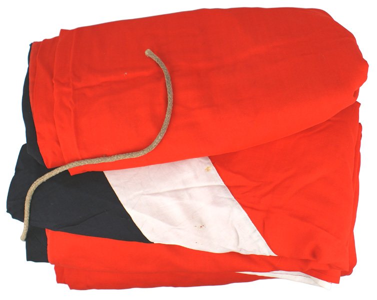 Large German WWII Hitler Youth flag: H-127 Large Hitler Youth flag. Printed black tilted swastika on a white diamond with a dissecting white panel - sewn to a red field. 140" x 173". Swivel hook and rope loop in corners. About II