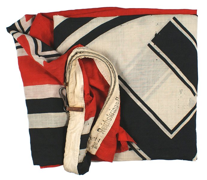 German WWII Navy Kriegsflagge: H-130 Navy "Kriegsflagge". Black swastika within a white circle with white and black strip dissected panels - all on a red field. Black Iron Cross in upper left corner. Sleeve is stamped with an eagle