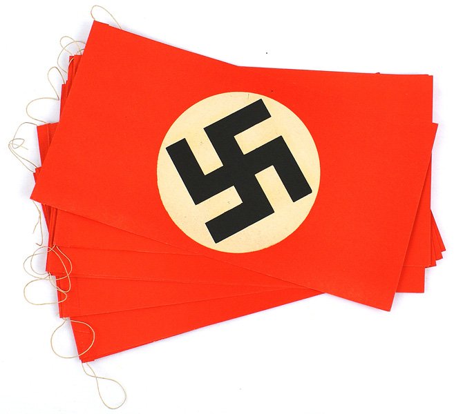 Lot 11 German WWII Nazi paper flags: H-134 Lot of 11 Nazi paper flags. All connected on a string to form a wall decoration. Each measures 4 3/4" x 8 7/8". I