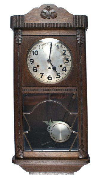 Unusual German 1930s wall clock swastika WWII: H-143 Unusual German 1930's wall clock. Westminister works with a pendulum and original key. Crystal door panel engraved with a 3 1/4"x 2 1/2" early Party/SA type eagle with a large swastika. Bonnet t