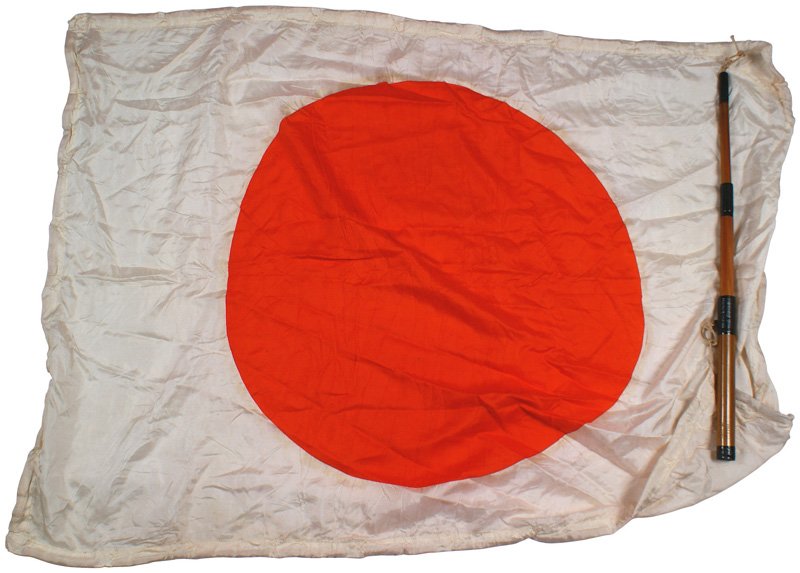 Japanese WWII silk meatball flag: H-167 Japanese WWII silk "meatball" flag. Reinforced border. 28 1/2" x 33 1/2". Still tied to a 3-section telescoping bamboo hand held pole. II