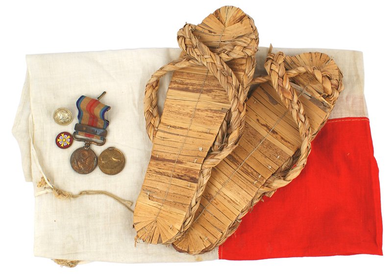 Lot 4 Japanese WWII items flag medal: H-176 Lot of 4 Japanese WWII items: (1) Silk "meatball" flag. With tie ends. 30" x 36". (2) China Campaign Medal with ribbon. (3) Two medals and two pins. (4) Island made bamboo sandals. II
