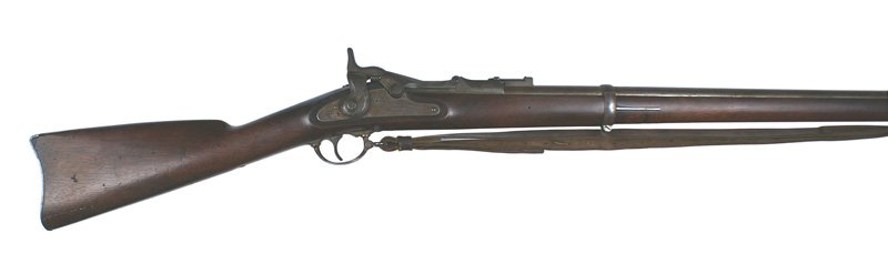 M1868 Allin Conversion U.S. Springfield Rifle: M-020 M1868 Allin Conversion-U.S. Springfield Rifle. 50 caliber. 32 1/2" darkened barrel/fittings. Breechblock is marked "1870" over and American eagle head and "US". Lock plate has an American eagle,