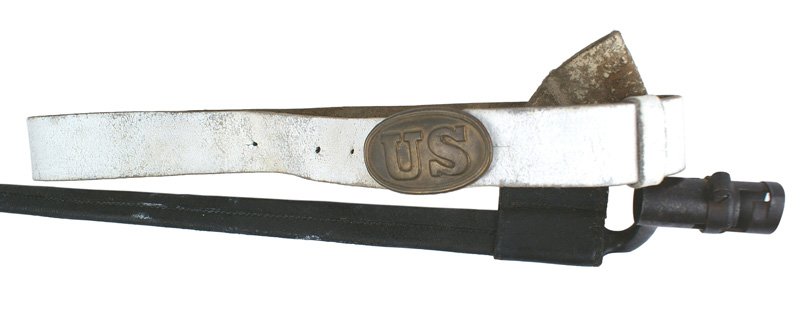 U.S. Civil War socket bayonet: K-020 U.S. socket bayonet for the M1835 and 1842 muskets. 17 3/4" blade shows pitting and still retains some traces of bluing. Marked "US" and "A". Overall the finish has darkened. With scabbard varia