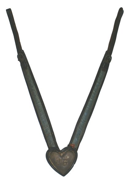 Civil War parade martingale: K-141 Civil War parade martingale. 5 1/2" x 5 1/4" leather heart-shaped background holding a brass heart with relief applied numbers "85". 2" wide blue leather straps with black scalloped inner border