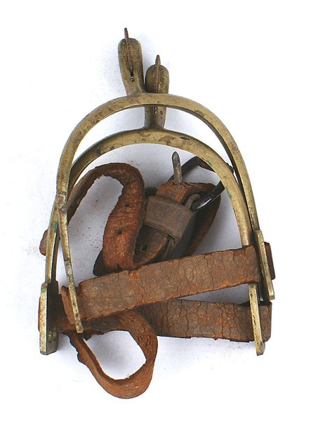 Civil War Cavalry brass spurs: K-143 Civil War Cavalry brass spurs. Dove head with a steel rowel. Aged leather straps - only 1 is complete with both buckles/roller bars. About II