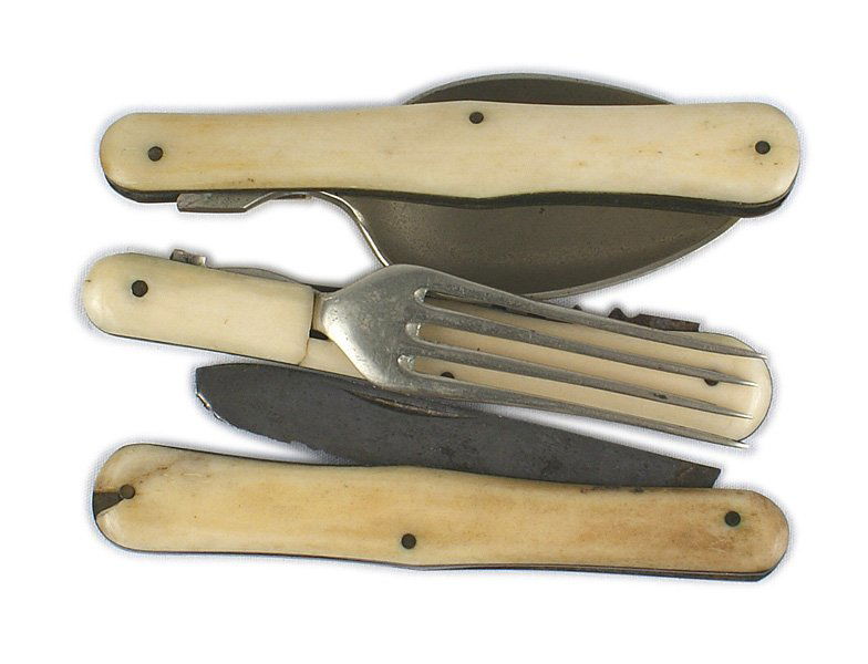 Lot of 3 U.S. jack knife utensils: K-182 Lot of 3 matching jack knife/utensils: (1) 3 1/2" off white bone handle with a well used 2 1/8" blade. (2) Matching handle with a folding spoon. (3) Matching handle with a folding fork and cork
