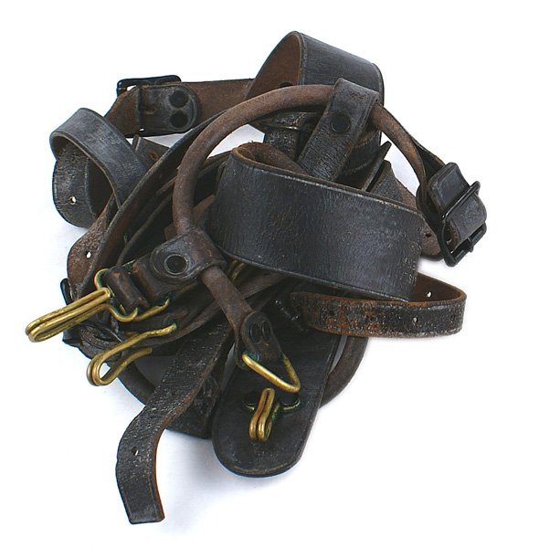 U.S. Indian Wars period strap harness: K-219 Indian Wars period leather equipment strap harness - similar to the Palmer brace yoke. Has buckles, straps and 4 brass hooks. Stamped "ROCK ISLAND ARSENAL - E.H.". II