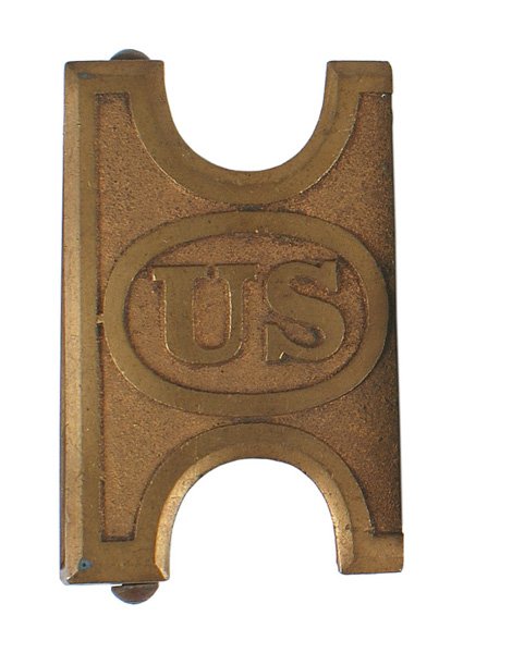 U.S. Indian Wars cartridge belt buckle: K-228 Cast gilt brass large cartridge belt buckle. Oval with a relief "US". Reverse has a belt brace with a roller bar and tongue. Indian Wars period. II