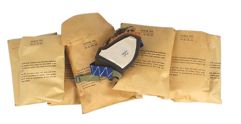 Lot of 13 U.S. WWII Type III M-1943 dusting goggles: N-082 Lot of 13 U.S. WWII "Type III M-1943" dusting goggles. Tinted Acetate lenses, leather frame and elastic band. 12 pairs have the original issue envelope. II+
